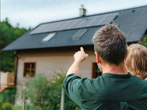 father-and-daughter-view-solar-panels