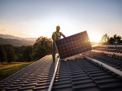 tech installing panels